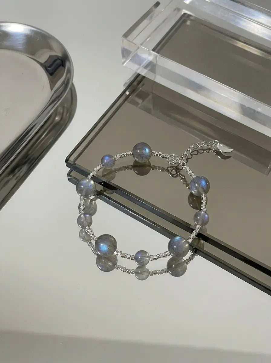 Soften Grey Moonstone bracelet - styled flat lay