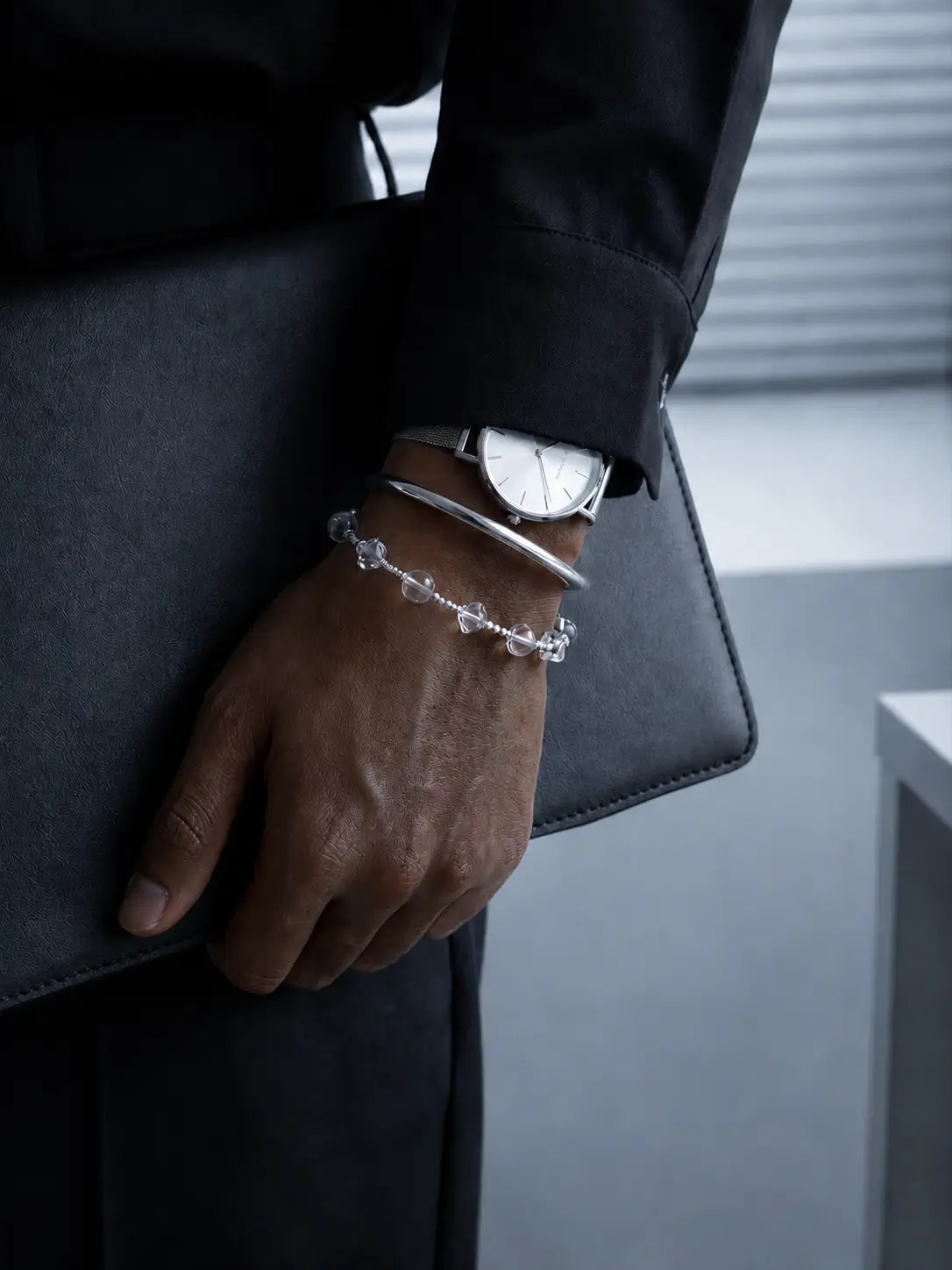 Clear quartz VOID bracelet styled with a watch